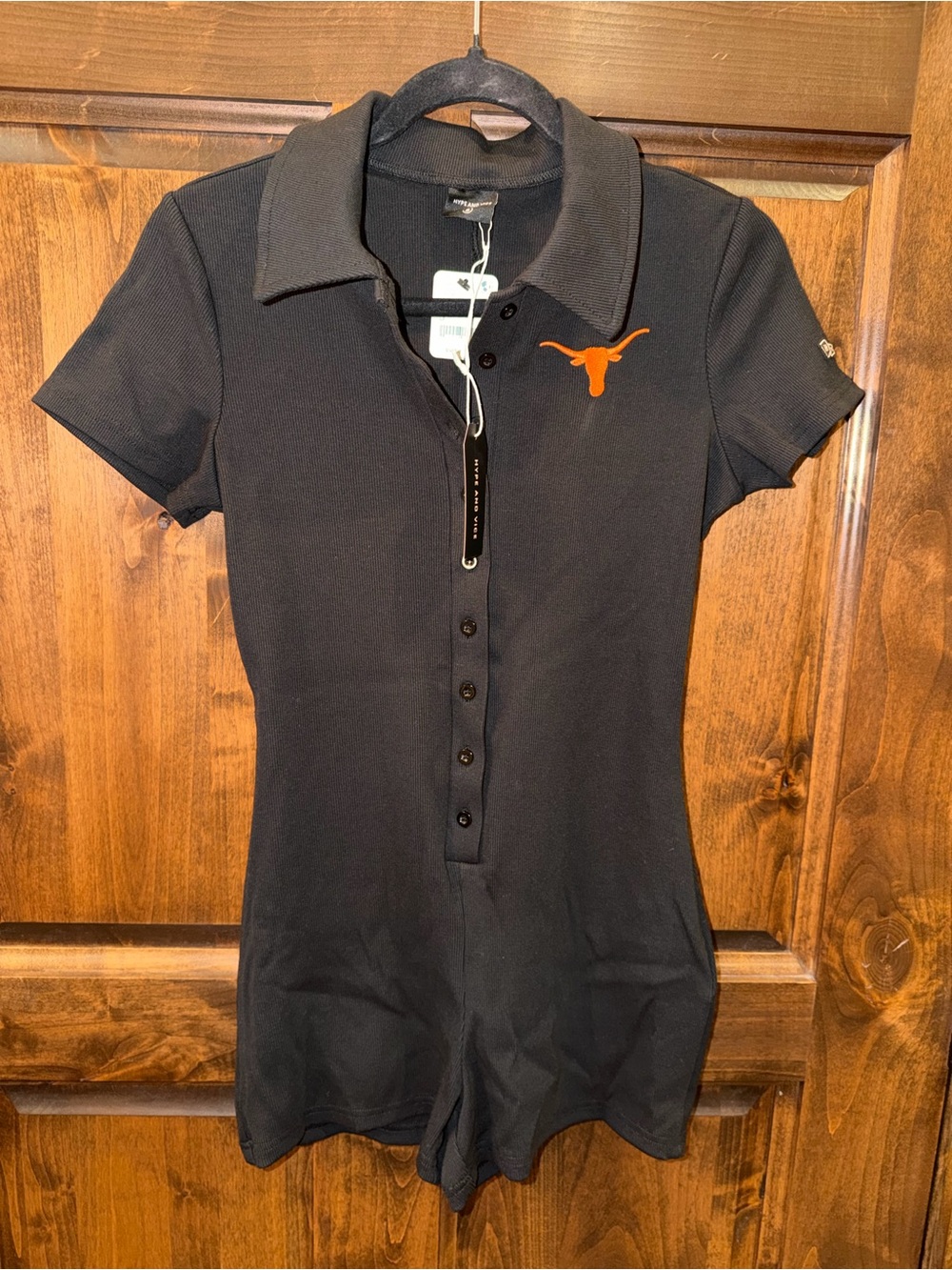 Texas Black Short-Sleeve Polo Romper with Orange Longhorn Accent